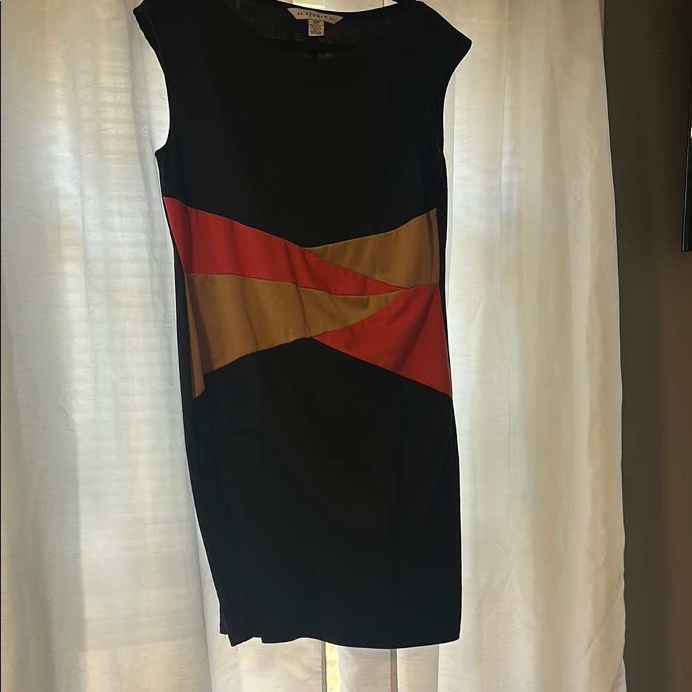 Elegant Black Dress with Orange and Gold Accents